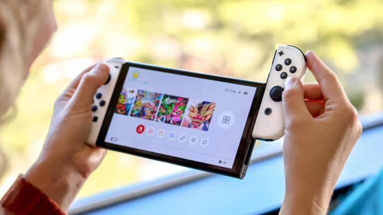 Nintendo Switch OLED being played in Handheld mode.