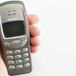 The Nokia 3210 classic phone in hand