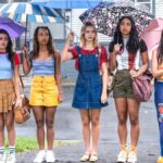 (left to right) Maia Reficco, Zaria, Bailee Madison, Chandler Kinney, Malia Pyles stand while holding umbrellas in Pretty Little Liars: Summer School