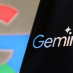 Google Gemini logo on phone with Google logo in background