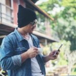 Hipster man resting at home balcony