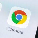 An image of the Google Chrome logo on a smartphone, representing an article about how to set Chrome flags