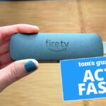 Fire TV Stick 4K held in hand