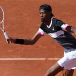 Christopher Eubanks plays a shot at the French Open