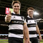 Barbarians players give the thumbs up on the pitch in Cardiff