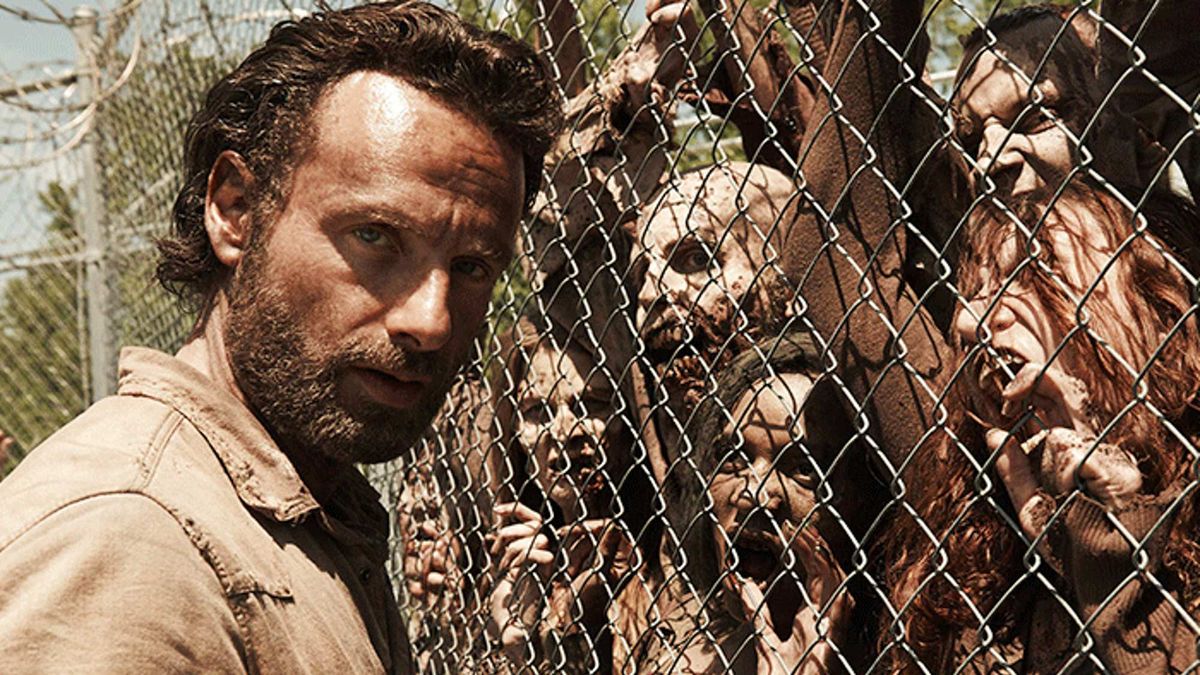 Andrew Lincoln and zombies in The Walking Dead