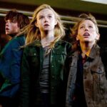 Joel Courtney, Elle Fanning, and Ryan Lee in Super 8 movie (2011)