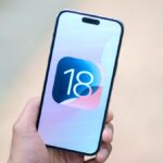 iOS 18 logo on an iPhone 15 Pro