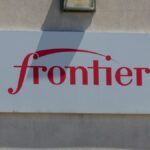 The Frontier logo on a building