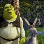 Shrek and Donkey standing side-by-side looking confused in