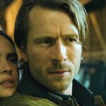 Adria Arjona and Glen Powell in Hit Man