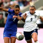 Maelle Lakrar and Alessia Russo fight for the ball during the UEFA Women