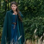 Lady Jane Grey (Emily Bader) in a blue robe and cloak in Prime Video