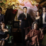 Han Sang-il (Yoon Je-moon), Oh Wan Soo (Kim Ha Neul), Seo Do Yoon (Rain), Park Mi-ran (Seo Yi-sook), Jang Tae-ra (Ki Eun-sae) and Kim Yong-guk (Jung Gyu-woon) pose for a family portrait in Red Swan