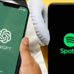 ChatGPT logo on phone next to Spotify logo on phone