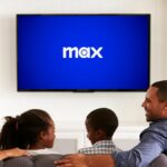 Max logo on a television screen in front of a family