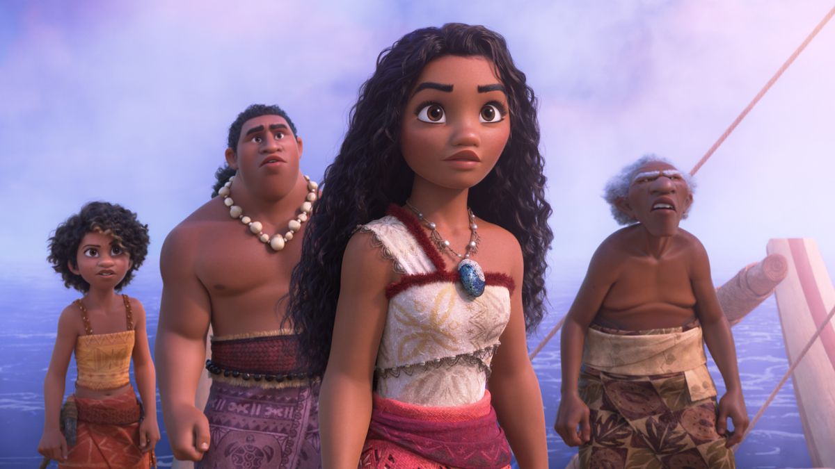 A screenshot from Moana 2, showing Moana (center) flanked by fellow people from Motonui