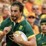 South Africa's Eben Etzebeth (R) runs the pitch ahead of South Africa vs New Zealand at The Rugby Championship 2024