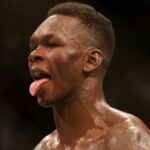 Israel Adesanya of Nigeria sticks his tongue out ahead of the UFC 305 live stream