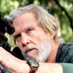 Dan Chase, the former C.I.A guy who just can't quit, played by a bearded Jeff Bridges, looks through a sniper gunsight in a scene from &quot;The Old Man&quot; season 2