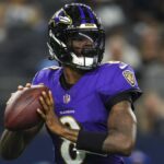 Lamar Jackson #8 of the Baltimore Ravens throws the ball ahead of the Bills vs Ravens live stream