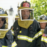 Howie (Kenneth Choi), Hen (Aisha Hinds), Captain Vincent Gerrard (Brian Thompson), Eddie (Ryan Guzman) dressed in beekeeper suits in 9-1-1 season 8