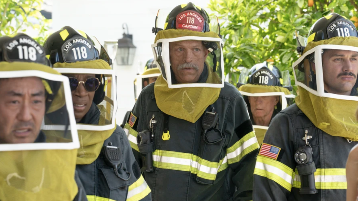 Howie (Kenneth Choi), Hen (Aisha Hinds), Captain Vincent Gerrard (Brian Thompson), Eddie (Ryan Guzman) dressed in beekeeper suits in 9-1-1 season 8