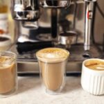 3 finished AI-generated coffee recipes in front of an espresso machine