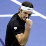 Taylor Fritz celebrates a point with a fist pump at 2024 US Open tennis.