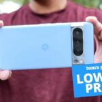 Pixel 8 Pro being held with a Prime Day banner