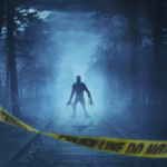 A spooky black monster outlined in shadow in a dark forest with yellow police crime scene tape in the foreground in Hulu's spooky true crime series 'Out There: Crimes of the Paranormal'