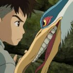 Mahito Maki (Luca Padovan) and the Gray Heron (Robert Pattinson) in The Boy and the Heron