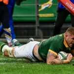 Malcolm Marx of the Springboks dives over the line for a try.