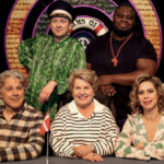 Alan Davies, Joe Lycett, Sandi Toksvig, Nabil Abdulrashid and Lou Sanders pose in the studio in QI season 22