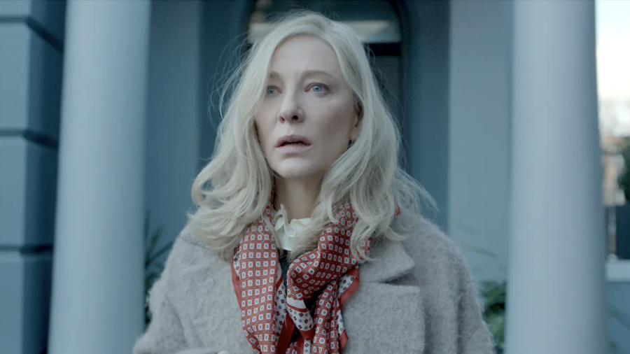 Actress Cate Blanchett, wearing warm winter clothing, looks shocks outside an expensive doorway in Apple TV+ original Disclaimer