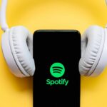 Spotify logo on phones with over-ear headphones