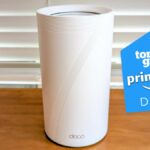 A TP-Link mesh router with a Tom's Guide Prime Day deals badge