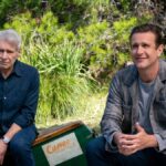 Paul (Harrison Ford) and Jimmy (Jason Segel) sitting outdoors side-by-side in &quot;Shrinking&quot; season 2