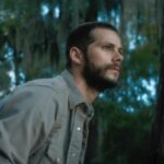 Profile shot of Dylan O'Brien as seen in Max Original Movie, &quot;Caddo Lake&quot;