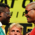 Francis Ngannou faces off with Renan Ferreira ahead of their fight.