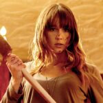 Sharni Vinson as Erin, holding an axe in &quot;You're Next&quot; (2011)