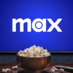 Max on a TV screen with a bowl of popcorn