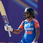 Harmanpreet Kaur of India reacts to her half-century during the 2024 Women's T20 Asia Cup match between India and the UAE at Rangiri Dambulla International Cricket Stadium on July 21, 2024 in Dambulla, Sri Lanka.