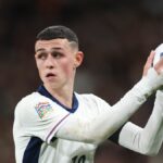 England's Phil Foden prepares to throw the ball during ahead of the Finland vs England UEFA Nations League 2024/25 game