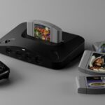 Analogue 3D console in black surrounded by the 8BitDo 64 Bluetooth controller and a variety of N64 cartridges