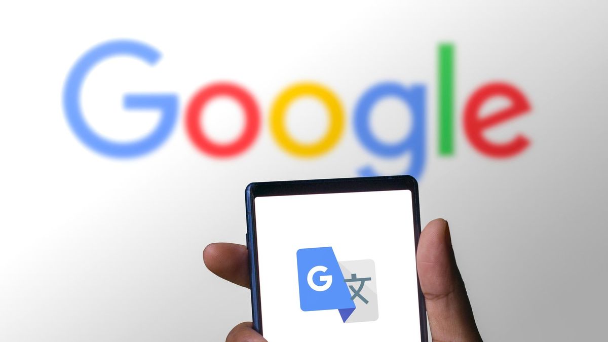 Google translate logo on a phone in front of a Google logo