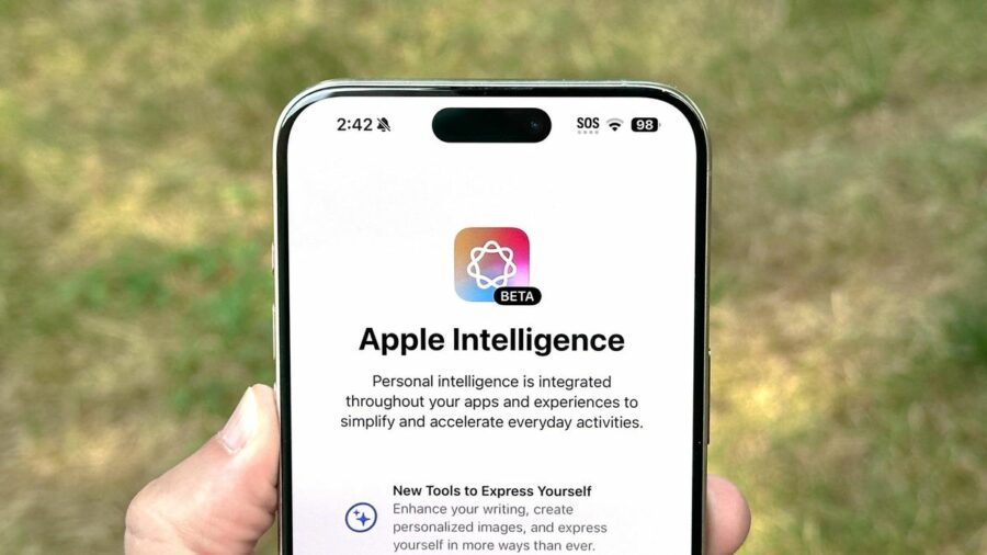 Apple Intelligence installation screen shown on iPhone 15 Pro Max.