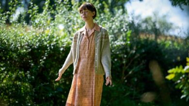 Claire (Rebecca Hall) stands peacfully in a sunlit grove in &quot;The Listeners&quot;