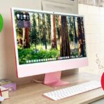 Apple iMac M4 with thumbs up and thumbs down graphics superimposed