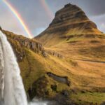 AI generated image of a mountain, waterfall and rainbow